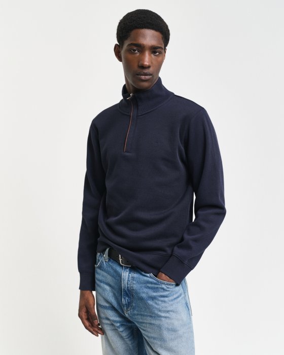 Gant dark blue quarter zip jumper on model