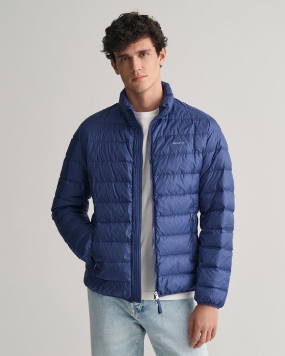 Gant blue puffer jacket on model