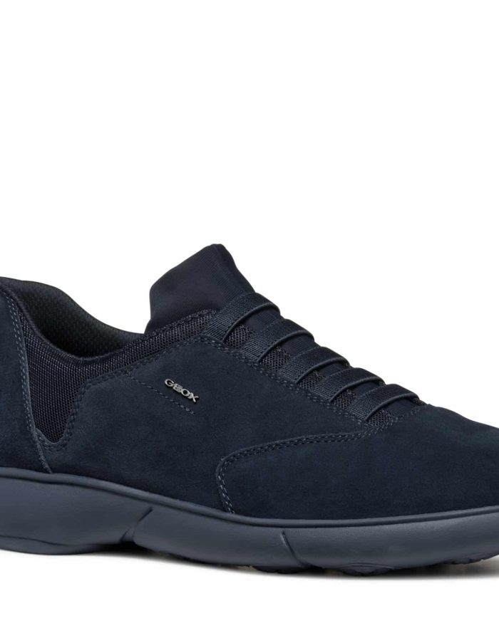 A dark blue suede sneaker with a rubber sole and elastic laces, suitable for casual or athletic wear.