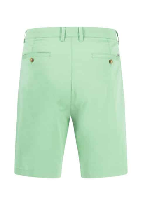 Green shorts with a flat front design, featuring belt loops and two back pockets with button closures. The shorts are shown on a plain white background.