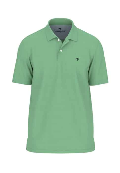 A green polo shirt with a small embroidered logo on the chest. It has a classic collar and buttons down the upper front. The shirt appears plain and casual, suitable for everyday wear.