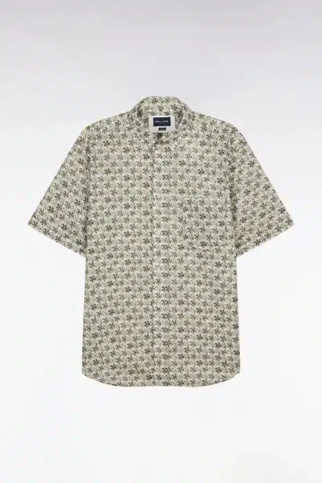 Short-sleeve button-up shirt with an all-over palm tree pattern. The shirt has a classic collar and one visible chest pocket. The background is plain white.