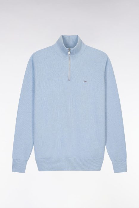 Light blue quarter-zip pullover sweater with a high collar and small logo on the chest, shown against a plain white background.