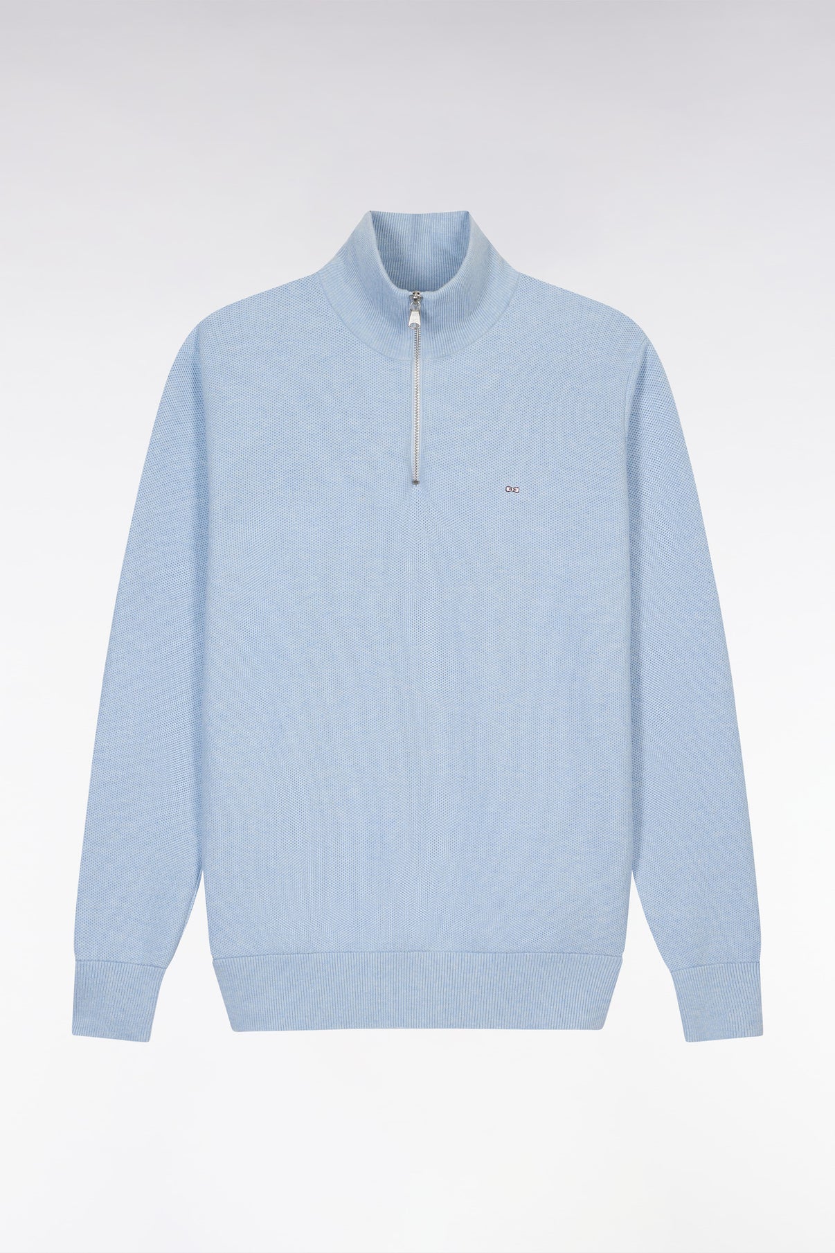 Light blue quarter-zip pullover sweater with a high collar and small logo on the chest, shown against a plain white background.