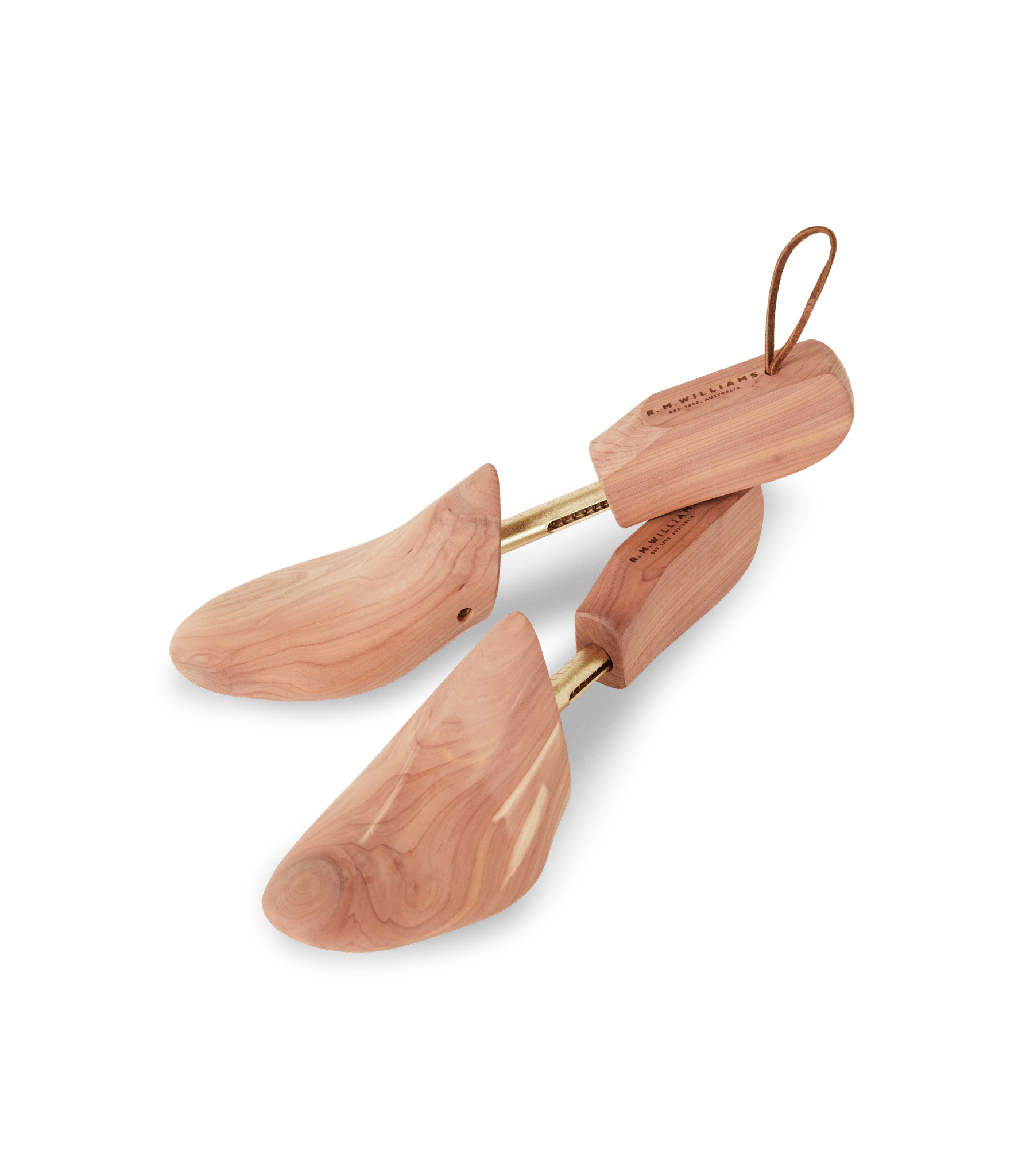 A pair of wooden shoe trees with brass hardware and leather loops, designed to maintain the shape of shoes.