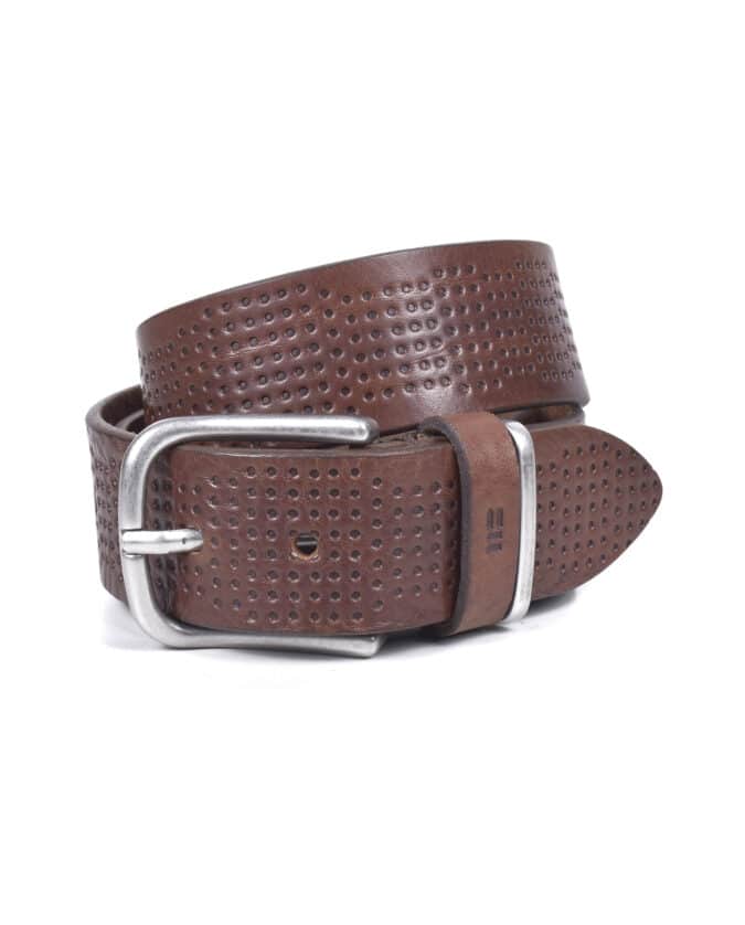 A brown leather belt with a silver buckle, featuring a pattern of small, evenly spaced holes along its length, displayed coiled on a white background.