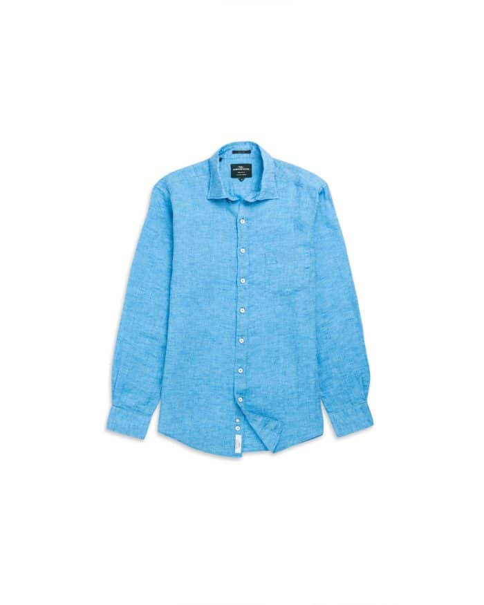 A light blue, long-sleeve, button-up linen shirt is laid flat against a white background. The shirt has a collar, a chest pocket, and white buttons down the front.