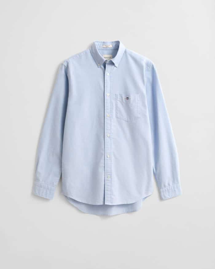A light blue long-sleeve button-down shirt with a front chest pocket, displayed against a plain white background.