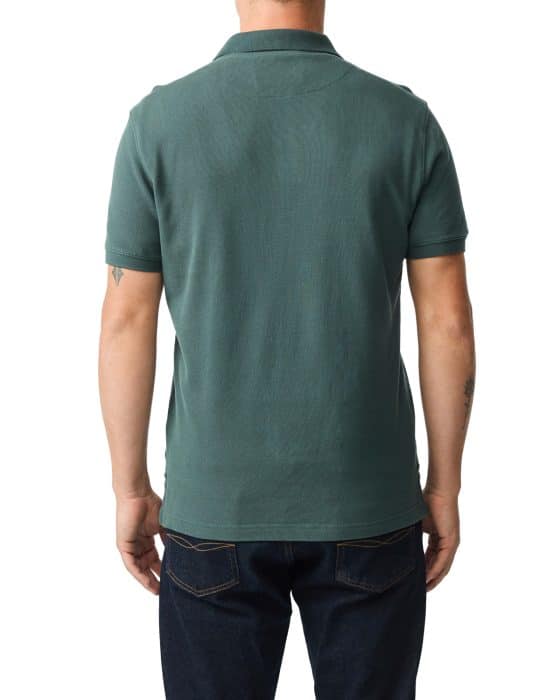 A person wearing a short-sleeve dark green polo shirt and dark blue jeans is standing with their back to the camera against a white background.