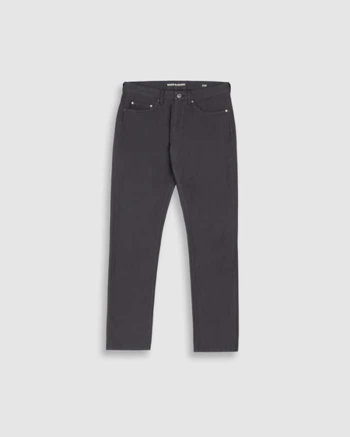 A pair of black straight-leg jeans with five pockets, front button and zipper closure, displayed flat against a light gray background.
