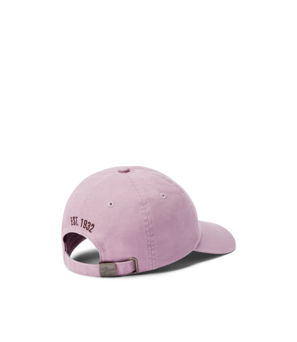 A light purple baseball cap viewed from the back, featuring an adjustable strap with a metal buckle and the text EST. 1932 embroidered above the opening.