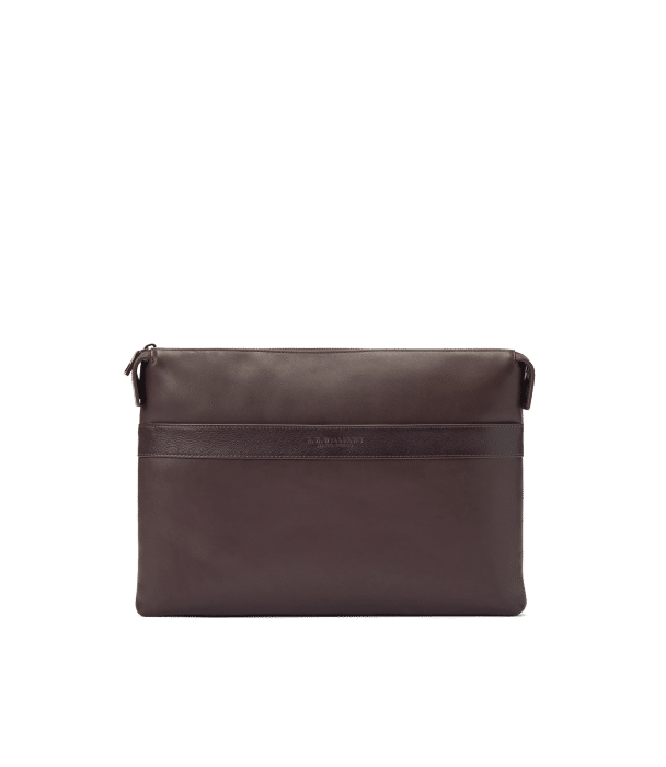 A dark brown leather zippered pouch with a minimalist design, subtle horizontal band detail, and a small embossed logo on the front, against a plain white background.