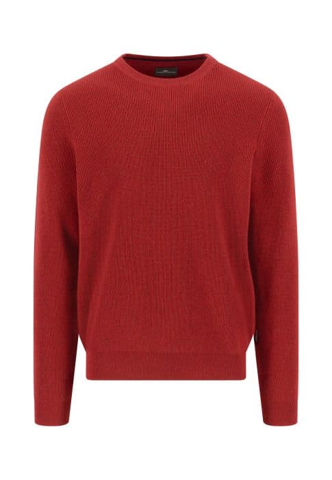 A plain, long-sleeved, crew neck sweater in a solid red color, displayed against a white background.