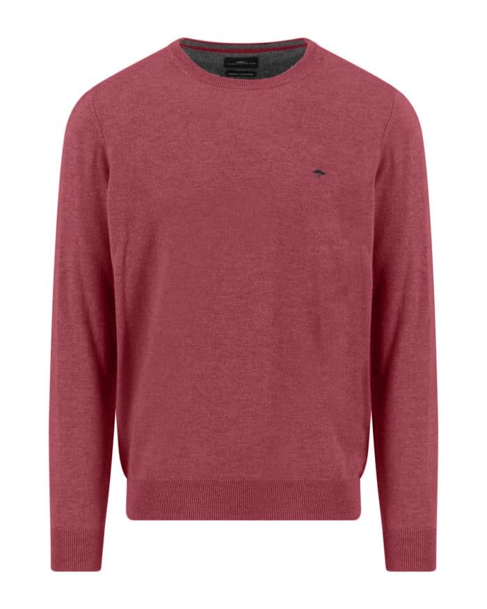 A plain, long-sleeved, crew neck sweater in a muted red color with a small, dark embroidered logo on the left chest. The sweater has ribbed cuffs, hem, and neckline.