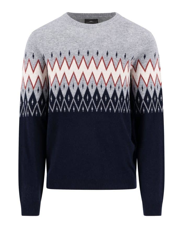 A long-sleeve sweater with a crew neckline, featuring a color gradient from light gray at the top to dark navy at the bottom. The sweater has a geometric diamond and zigzag pattern in white, red, and navy across the chest.