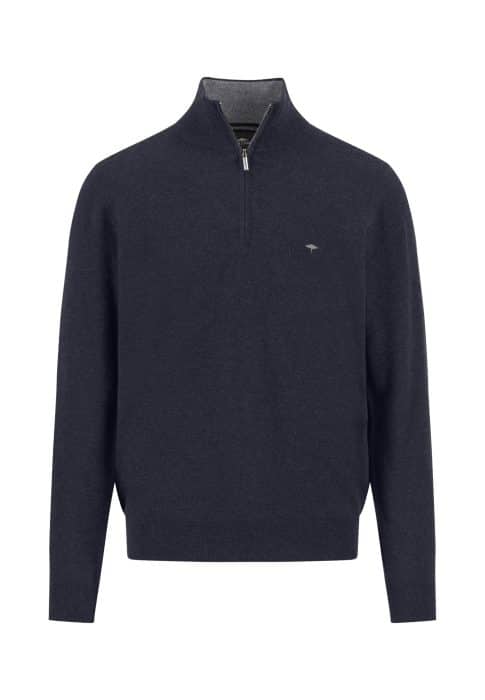 A dark navy blue, long-sleeve pullover sweater with a standing collar and a half-zip front. The sweater features a small embroidered logo on the left chest and has ribbed cuffs and hem.