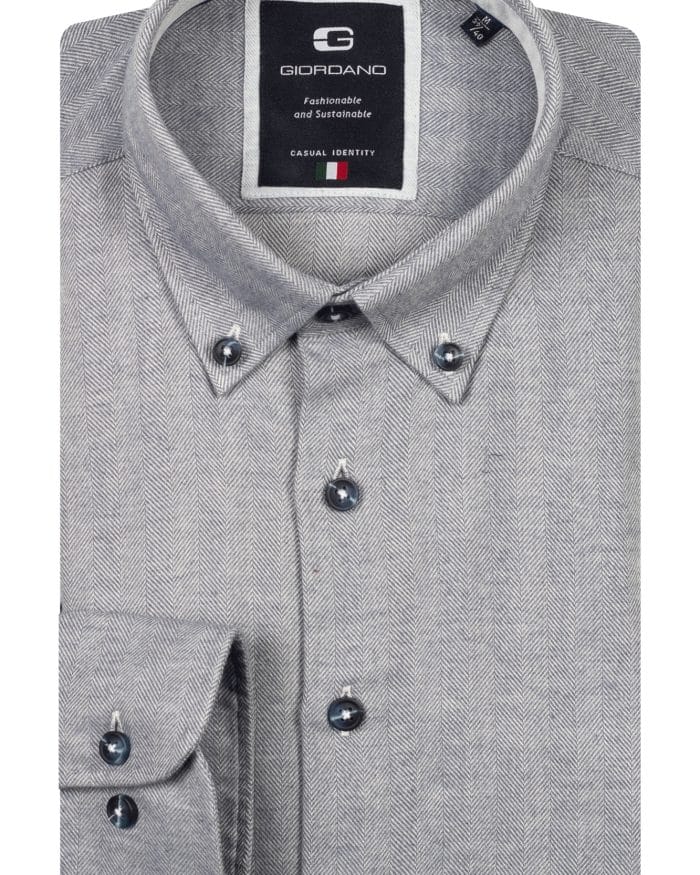 A neatly folded, light grey button-up shirt with a subtle herringbone pattern, dark buttons, and a visible Giordano brand label inside the collar.