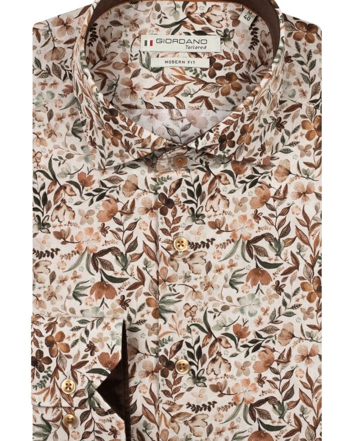 A folded long-sleeve dress shirt with a brown, beige, and white floral pattern. The shirt features a button-down front, brown buttons, and a Giordano label inside the collar.