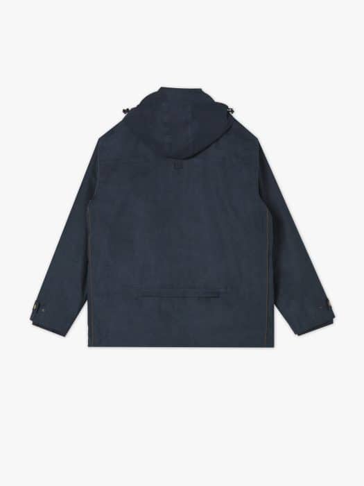 Back view of a dark blue hooded jacket with long sleeves, buttoned cuffs, and a horizontal seam pocket across the lower back, displayed on a white background.