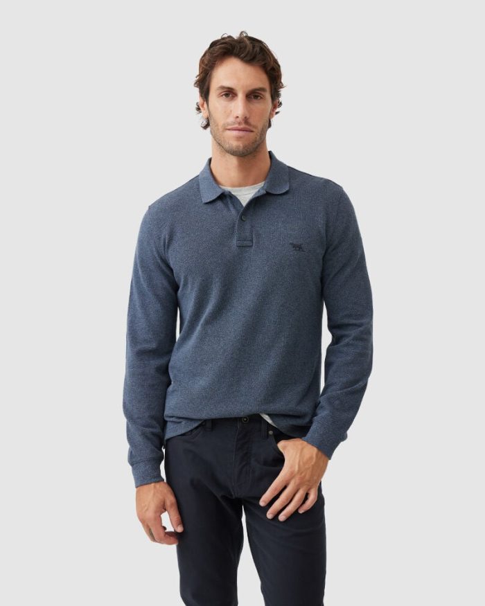 A man in a blue shirt.
