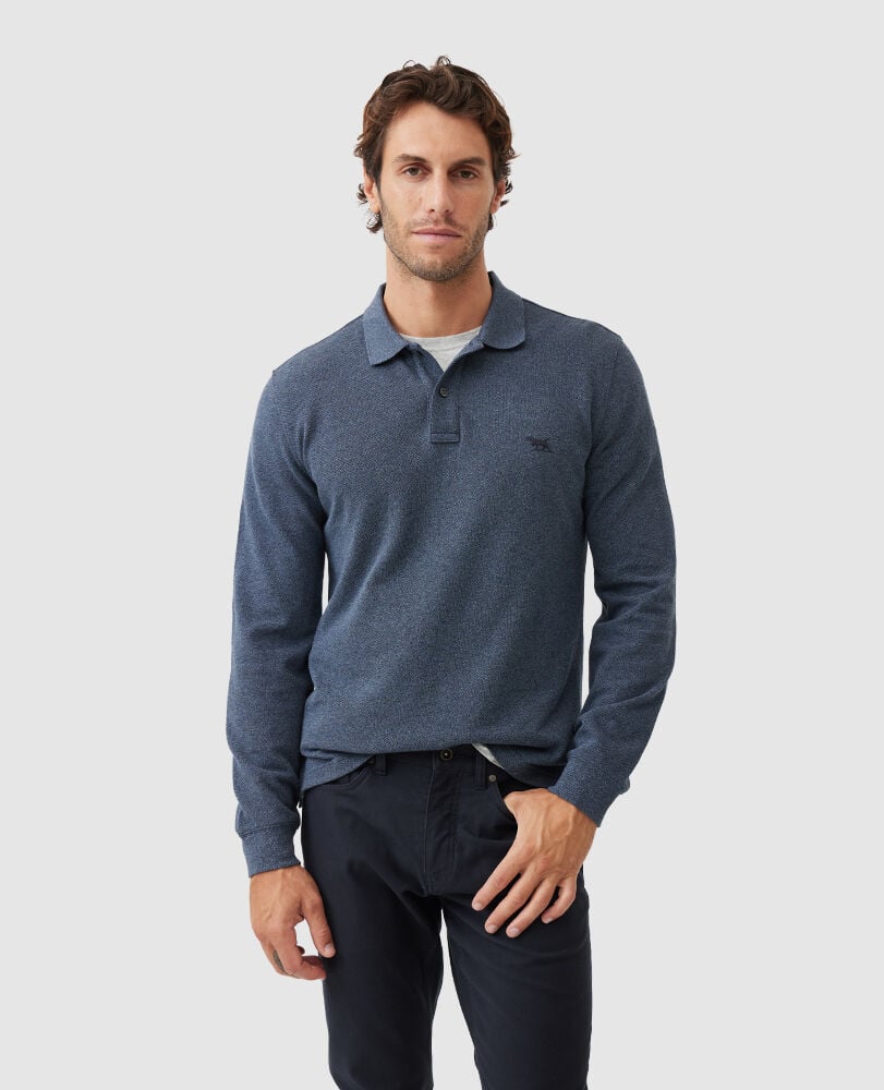 A man in a blue shirt.