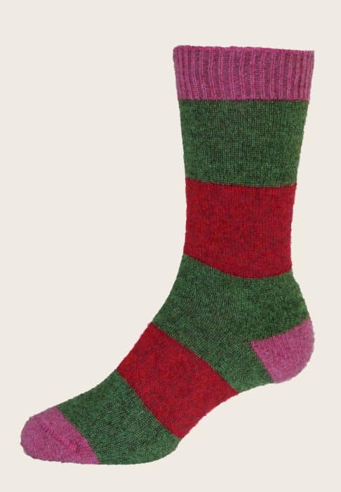 A single sock featuring wide horizontal stripes in green and red, with a pink cuff, heel, and toe against a plain light background.