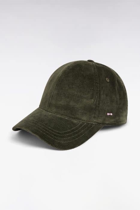 A dark green corduroy baseball cap with a curved brim, showing a small embroidered logo on the side, set against a plain light background.