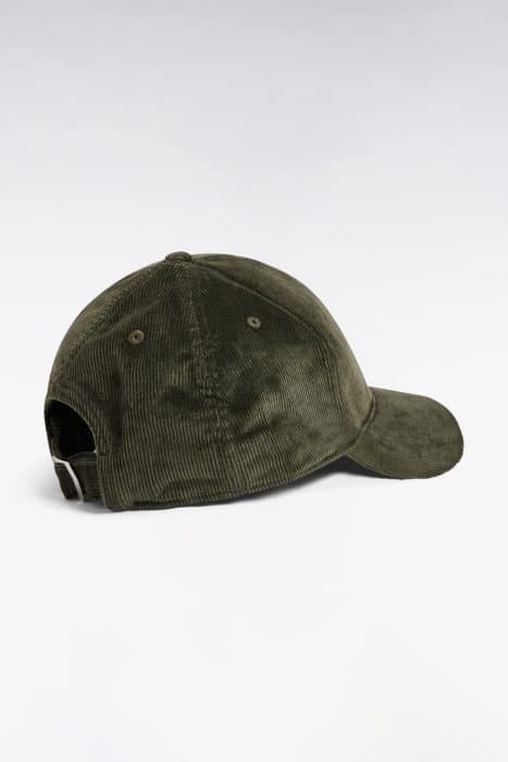 A dark green corduroy baseball cap is shown from the back, featuring a curved brim and an adjustable strap with a metal buckle. The background is plain white.