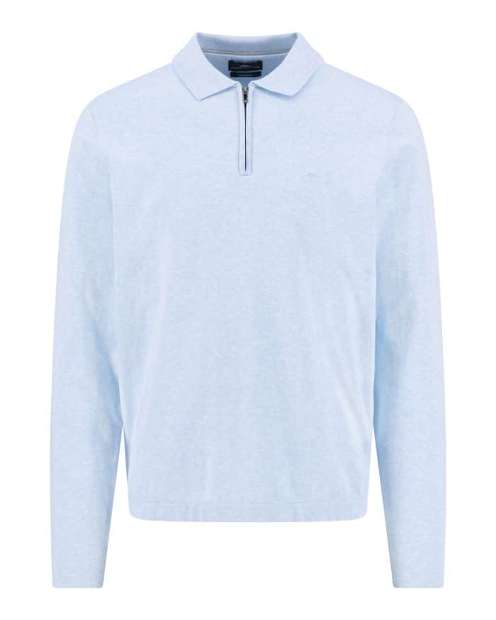 A light blue long-sleeve polo shirt with a collar and a short front zip, displayed on a plain white background.