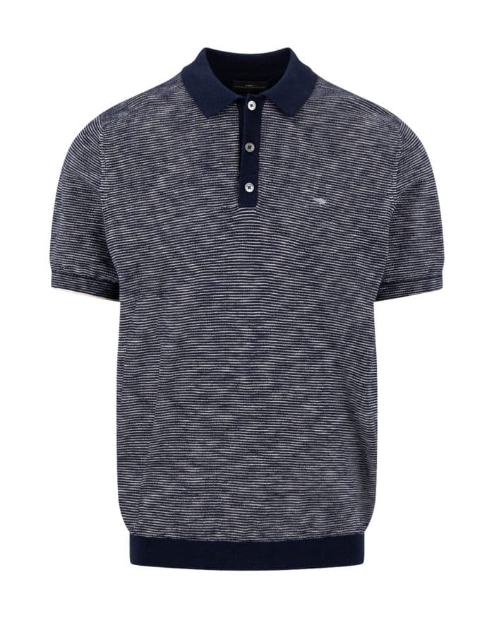 A short-sleeved men's polo shirt with a navy collar and cuffs, featuring fine horizontal white and navy stripes, a three-button placket, and a small subtle logo on the left chest.