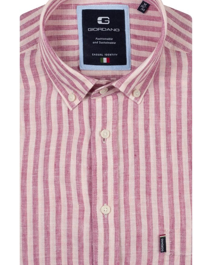 A folded long-sleeve button-up shirt with pink and white vertical stripes, featuring a collar and white buttons. The label reads Giordano and Fashionable and Sustainable.