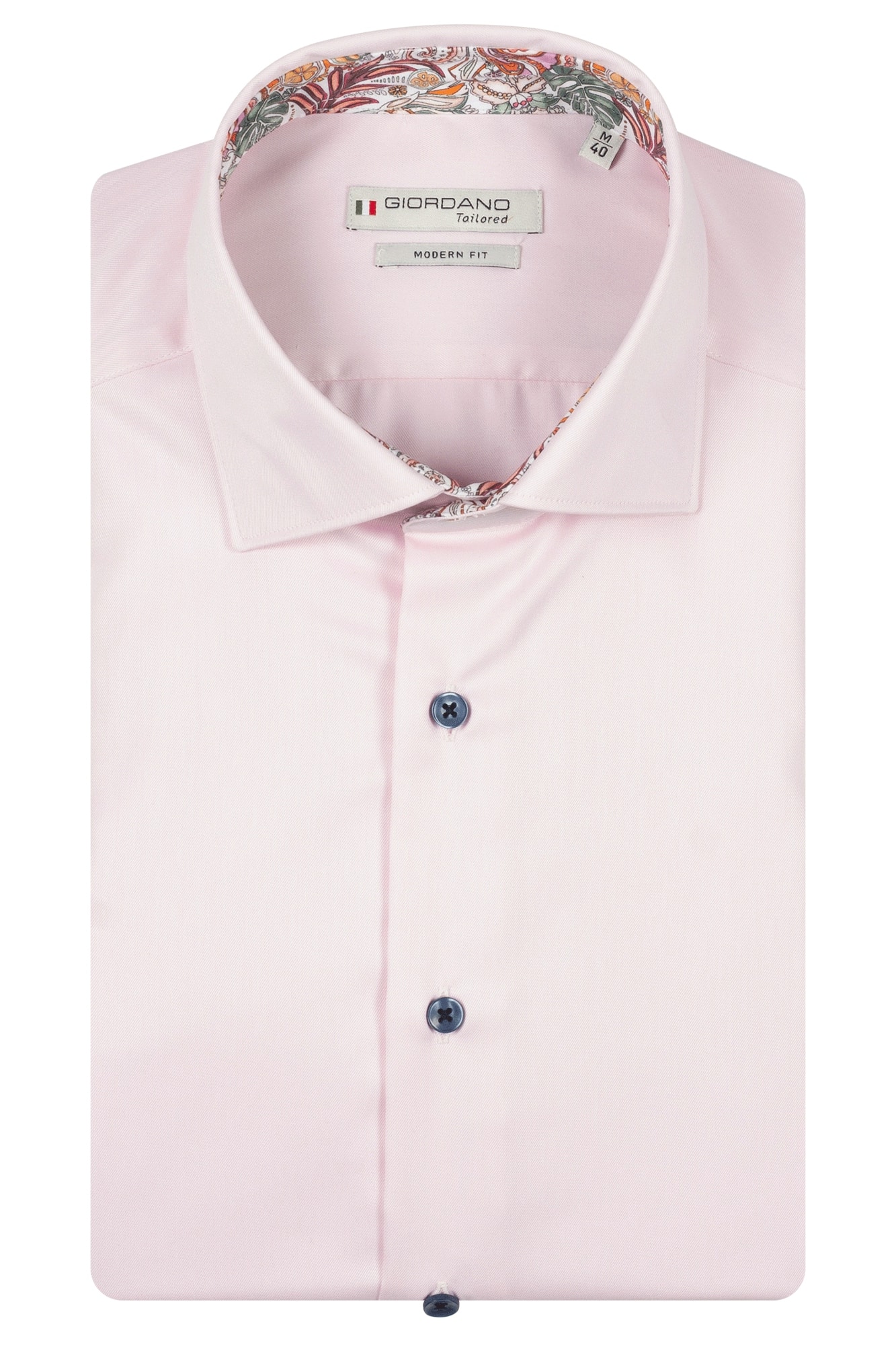 A neatly folded, light pink dress shirt with dark buttons, a pointed collar, and floral-patterned fabric inside the collar. The label reads Giordano Tailored Modern Fit.