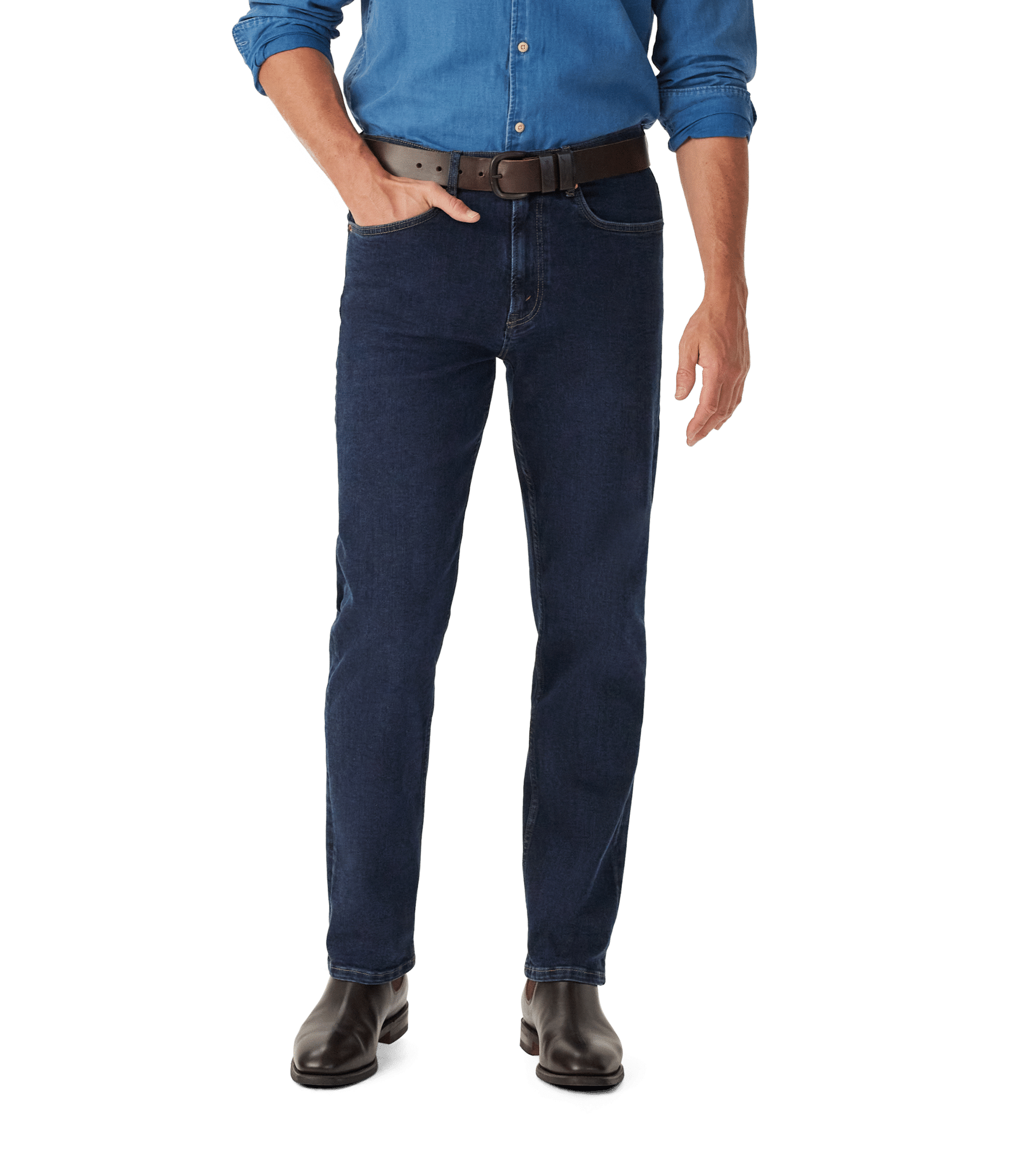 A person wearing a blue denim shirt, dark blue jeans, a brown belt, and brown shoes stands with one hand in their pocket against a plain white background.
