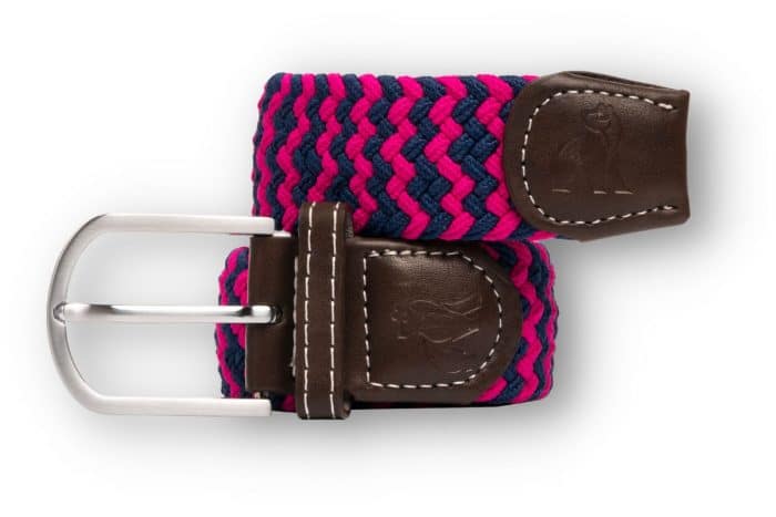 A woven belt with pink, blue, and black strands, featuring brown leather ends with white stitching and a silver buckle.