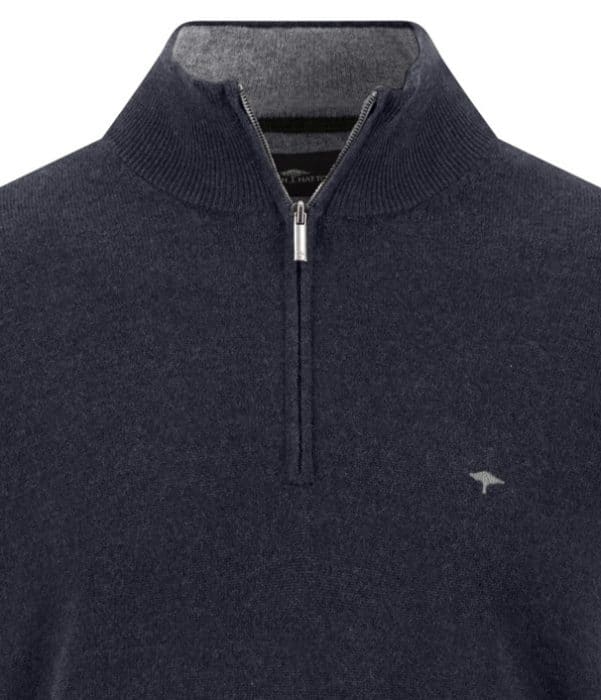 Close-up of a dark grey quarter-zip jumper with ribbed collar and a small embroidered logo of a fish on the left chest. The zip is silver, and the jumper appears to be made of a soft, knitted fabric.