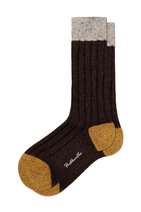 A pair of ribbed, dark brown socks with light brown toes, heels, and cuffs, featuring the word Pantherella on the sole.