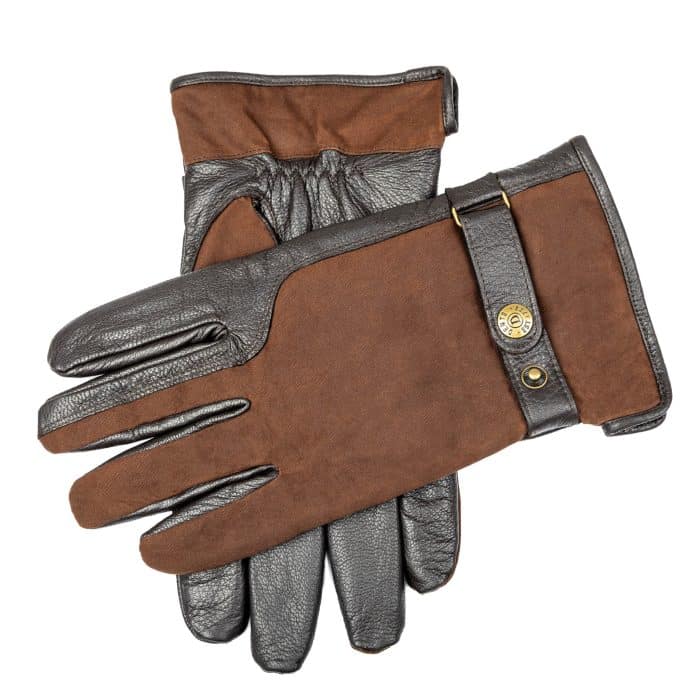 A pair of brown suede and dark leather gloves with a metal press-stud fastening on the wrist.