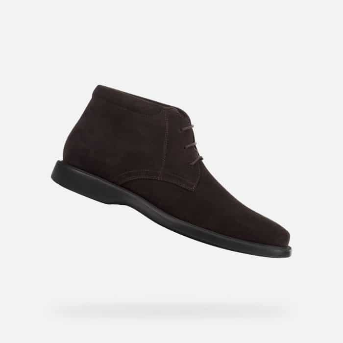 Dark brown suede chukka boot with matching laces and a black rubber sole.