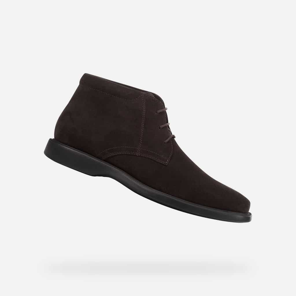 Dark brown suede chukka boot with matching laces and a black rubber sole.